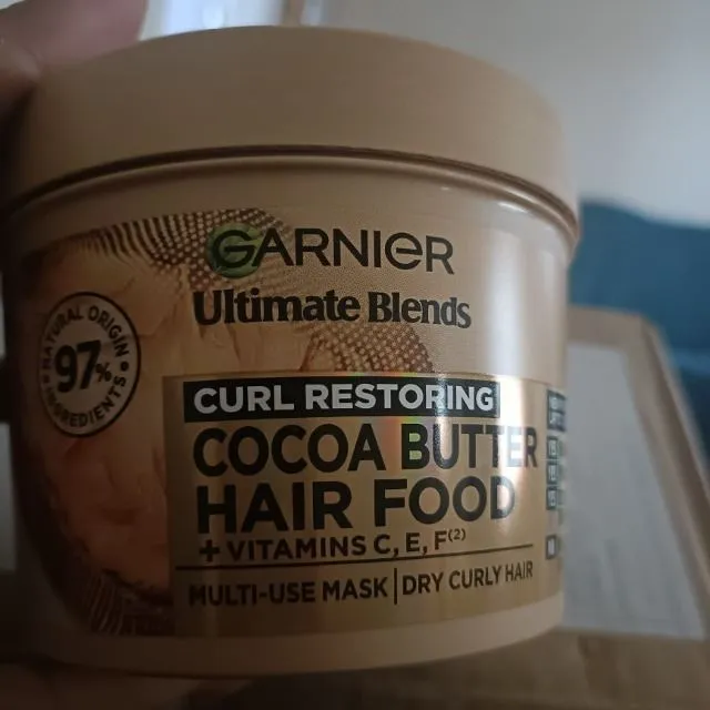 Coco butter hair food. Love this product, help to smooth out