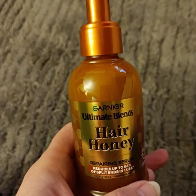 Garnier honey hair serum , makes my hair so soft and shiny.